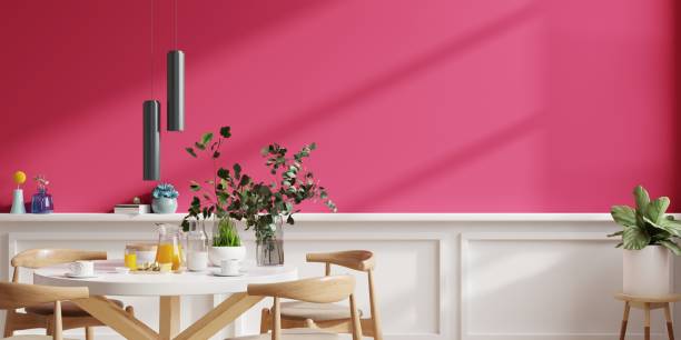 Modern style dining room interior design with viva magenta wall background. Modern style dining room interior design with viva magenta wall background.3d rendering red kitchen cabinets stock pictures, royalty-free photos & images