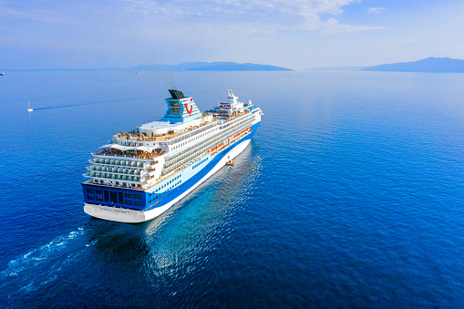 Rijeka, Croatia - June 5, 2022: Cruiser sails from port of Rijeka