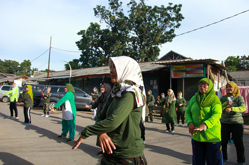 Senam Pagi or Senam Aerobik in Bandung, West Java, Indonesia, which is morning aerobic exercises and commonly with groups of middle age or elderly women on weekends.