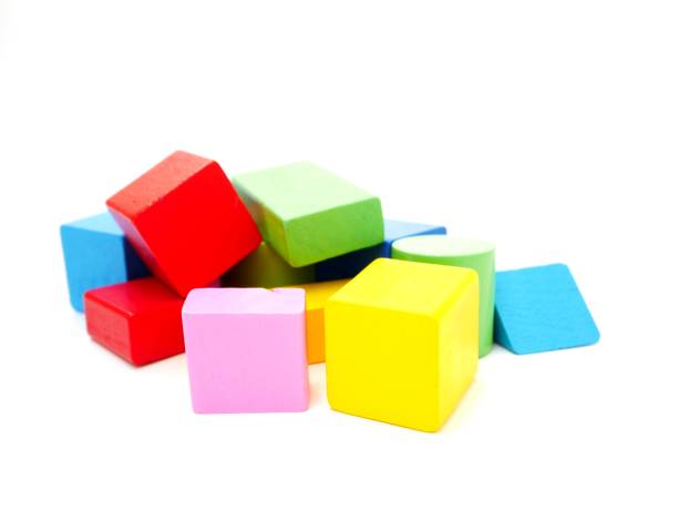 istock Colorful wooden shape block on isolated white background 1454916976