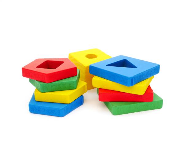 istock Colorful wooden shape block on isolated white background 1454917979