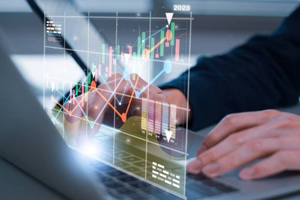 istock Professional businessman using laptop computer analyzes financial data,plans visions 2023 year,concept corporate future growth marketing,goal business strategy development investment with technology 1454920349