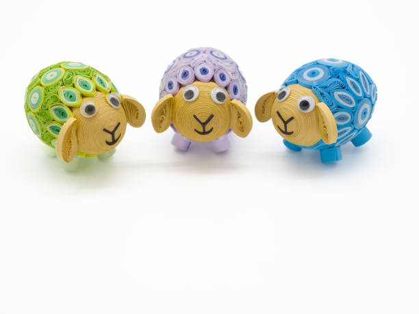 istock Three Pastel Quill Art Lamb Figurines 1454921960