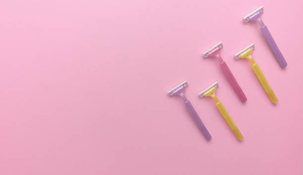 istock Overhead flat lay of disposable razors 1454922993