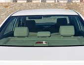 Rear seats headrest view inside the car back windshield