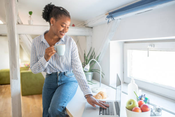 istock Young woman working from home 1454926995