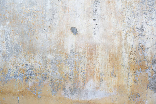 istock old stone or concrete wall texture and background, close up 1454930721