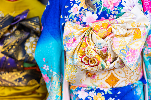 Close up details of colorful Kimono worn by young women on \