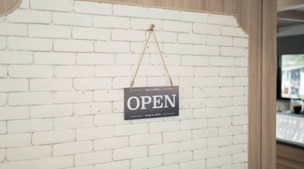 istock Welcome open sign in restaurant 1454934300