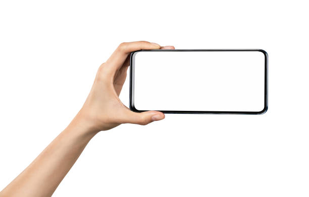 istock Clipping path, Hand holding smartphone isolated on white background. 1454937329