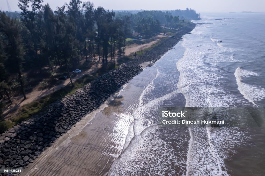 Beach Views India Aerial footage of Varsoli beach at Alibag, located 125 kms from Pune on the West Coast of Maharashtra India. Aerial View Stock Photo