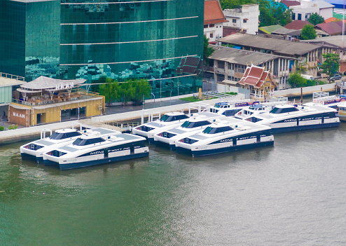 January 3, 2023, Bangkok, Thailand, a large passenger ship powered by electric power without emissions moored along the Chao Phraya River, Thailand's main river.