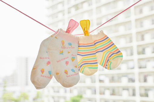 Socks hung out to dry on balcony