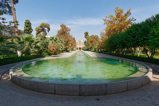 Low-angle view of a beautiful fountain in front of Golestan Palace in Tehran, Iran
