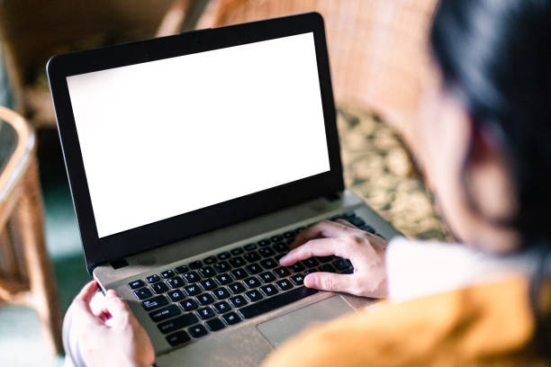 istock Adult Woman Interacting With Digital Devices 1454950594