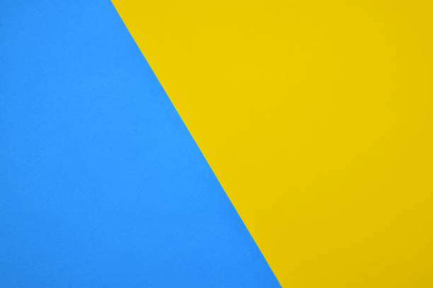 istock Top view of blue and yellow background 1454957130