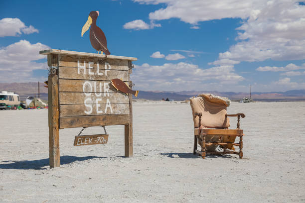 Bombay Beach, United States – March 20, 2022: Renegade artists have created odd installations along the dry lakeshore of the Salton Sea in Bombay Beach.