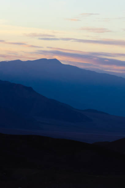 istock Vertical shot of mountains at sunset 1454959690