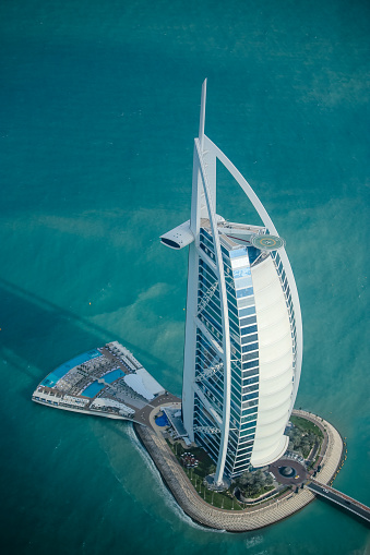 Du, United Arab Emirates – January 09, 2018: A vertical aerial view of Burj Al Arab Hotel, Dubai, United Arab Emirates