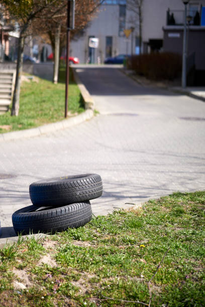 istock Steering wheels laying on a street on a sunny day 1454961042