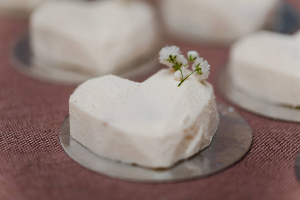 istock Wedding table with sweets, cake, pastries, muffins, sugar treats. 1454962636