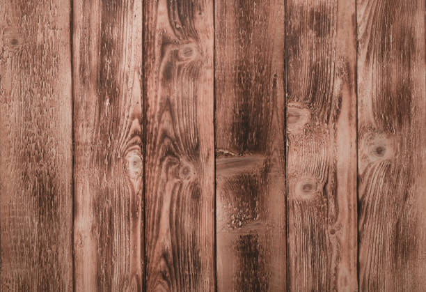 sfondo strutturato fatto di pannelli di legno - knotted wood plank wall abstract texture foto e immagini stock