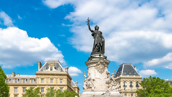 Paris, the Republic place, in the center, typical buildings in background