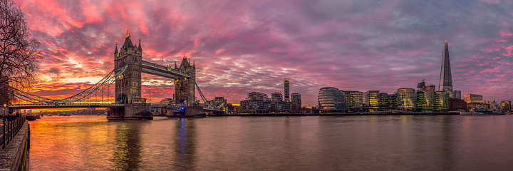 Dramatic sunrise skies above the iconic span of Tower Bridge