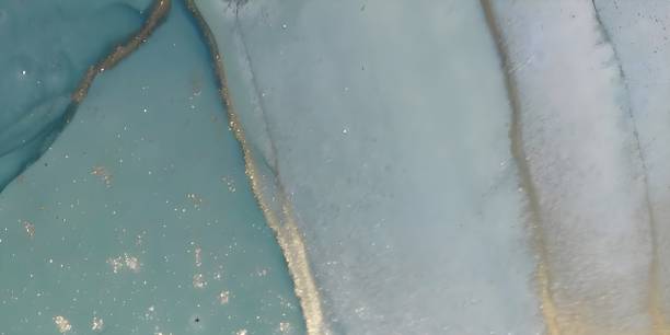 istock Luxury backdrop with turquoise marble texture and gold details 1454969301