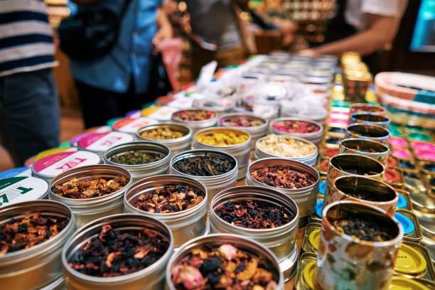 A closeup of tea herbs in cand on a table