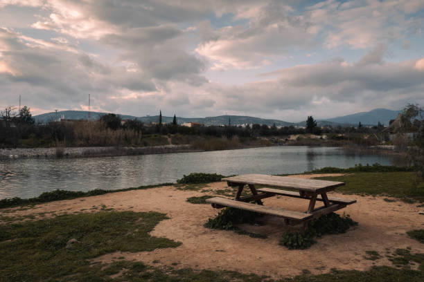 istock Table and chairs by the lake 1454972148
