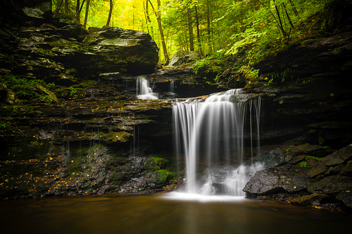 A scenic waterfalls in the Ricketts Glen State Park in Pennsylvania