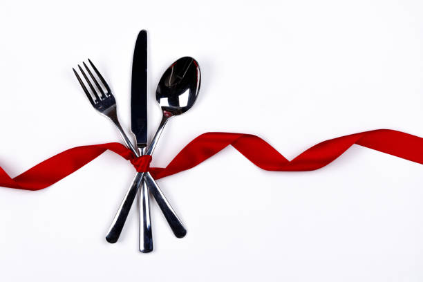 Cutlery set and ribbon stock photo