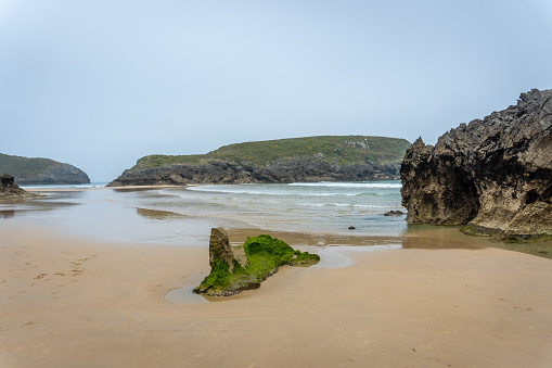 A beautiful landscape view of Sorraos beach on the Borizu peninsula in the town of Llanes, Asturias, Spain