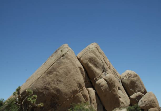 istock View of big rock formations under blue bright sky 1454974714