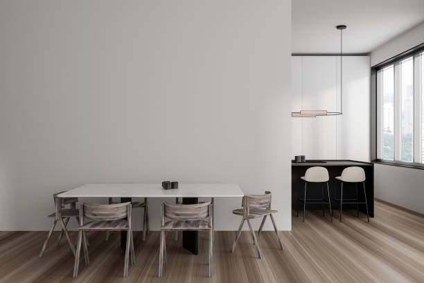 istock Light kitchen interior with dining area and bar island, window. Mockup wall 1454974827