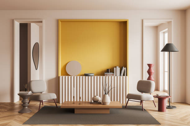 istock Bright living room interior with armchairs and drawer with decor. Mockup wall 1454976295