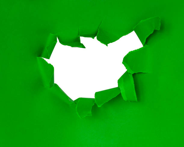 istock Green torn sheet of paper with whole space for text isolated 1454976734