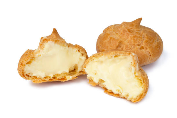 istock Cream puff bakery profiterole isolated on the white background 1454978079