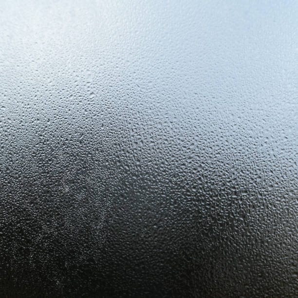 istock large dew drops on the window after condensation has settled on the window. 1454981824