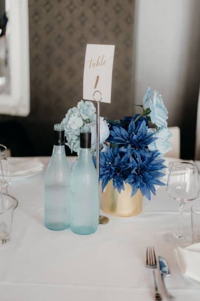 istock Closeup of a bouquet and drinks on a table 1454986863