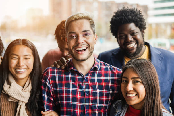 istock Young diverse people having fun outdoor laughing together - Diversity concept 1454991959