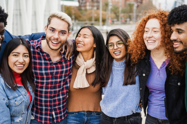 istock Young diverse people having fun outdoor laughing together - Diversity concept 1454991963