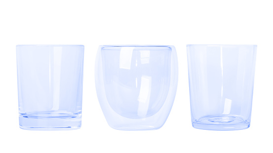 set of blue glass glasses of different sizes Small and large glasses. Empty glass glasses.
