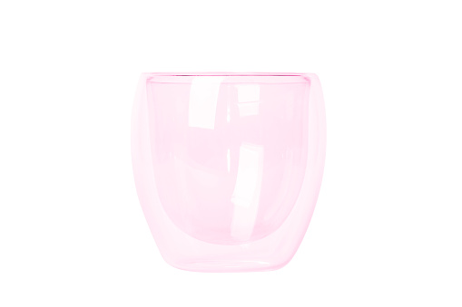 Glass empty glass with a double bottom of the average size. Rose glass. Isolated.