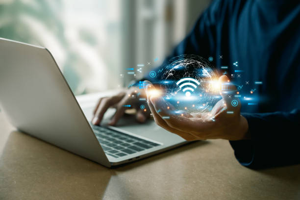 istock Business using laptop,with wifi icon,business communication social network concept. 1454998820