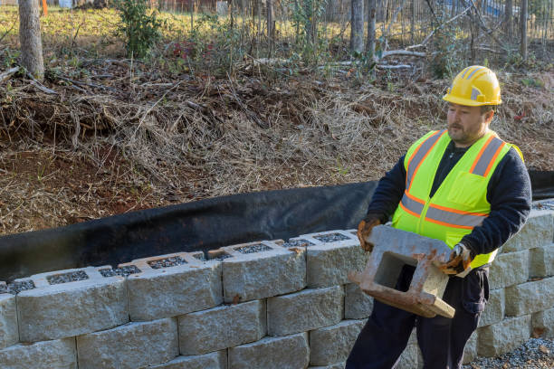 istock On the construction site of a new large block retaining wall, a contractor was seen installing the new wall during the installation process 1455007413