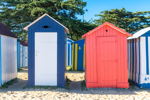 Wooden beach cabins on the Oleron island in France, colorful huts