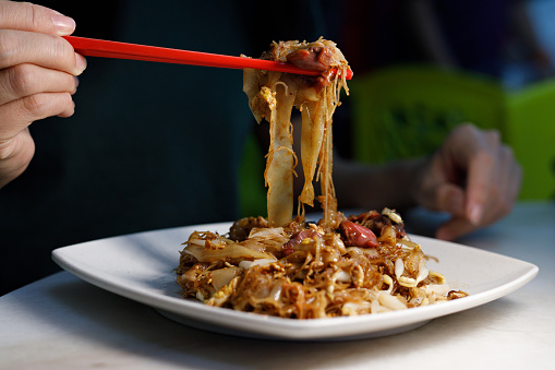 Asian fried noodle with fresh Cockle, Malaysia street food