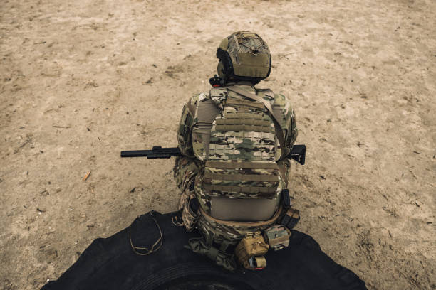 istock Soldier in camouflage having shooting training 1455010697